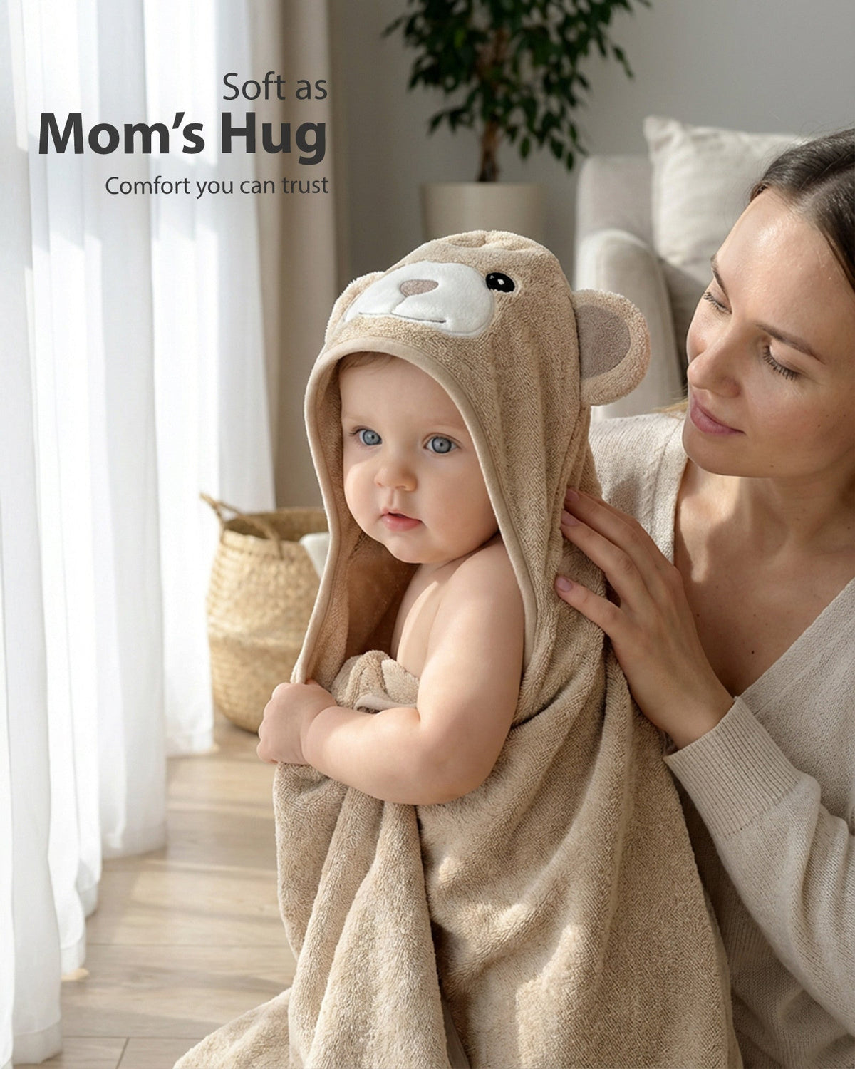 Soft as mom's hug – mother holding her baby in the Cream Bear hooded towel