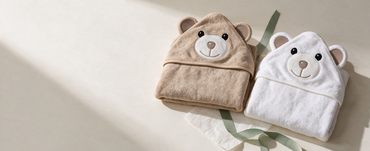 Cream Bear and Little Bear towels with a sage ribbon