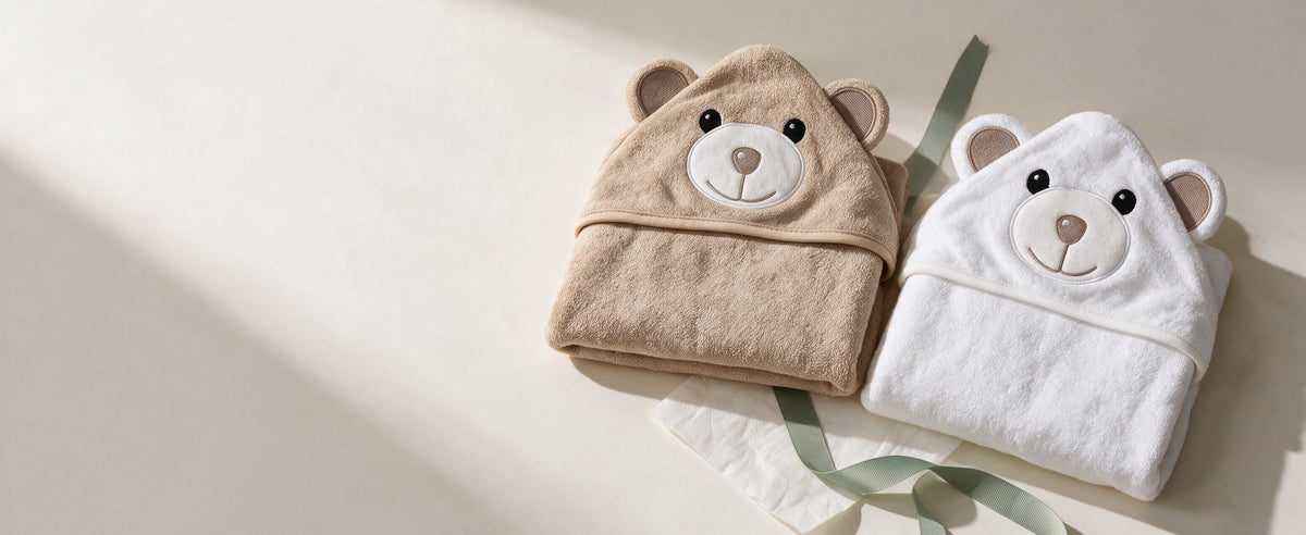 Cream Bear and White Bear hooded towels with a sage ribbon