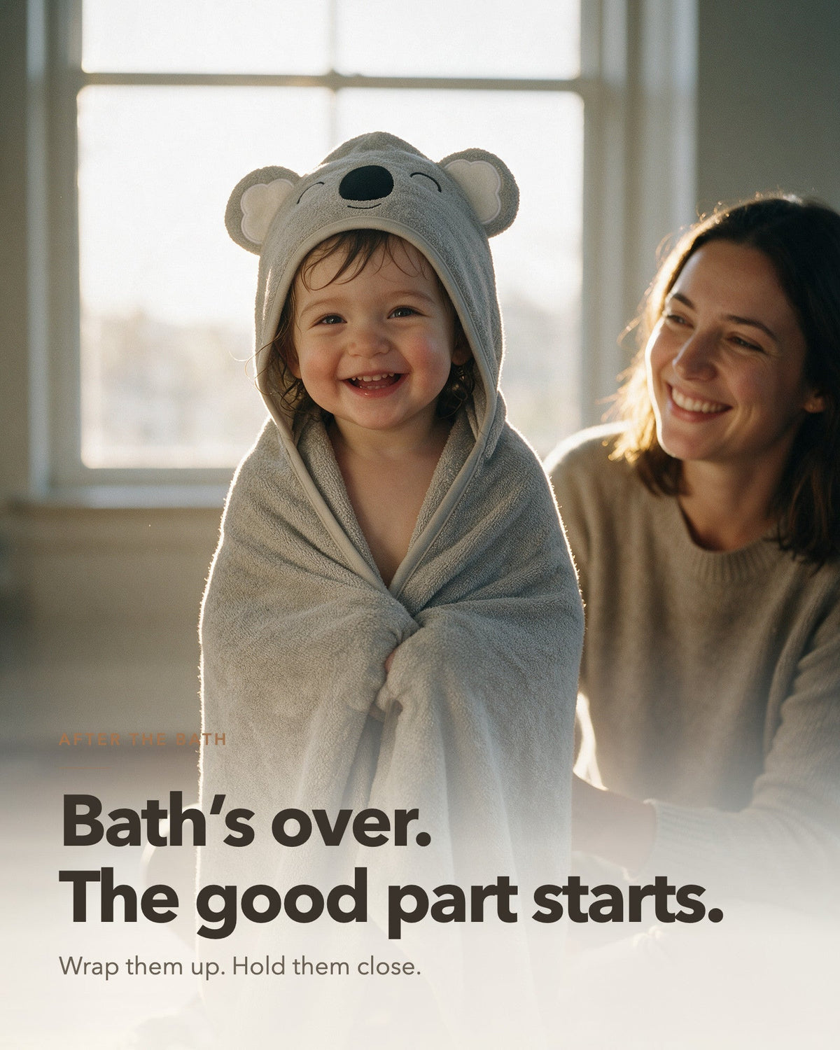 Bath's over, the good part starts – toddler in the Sleepy Koala towel with mum