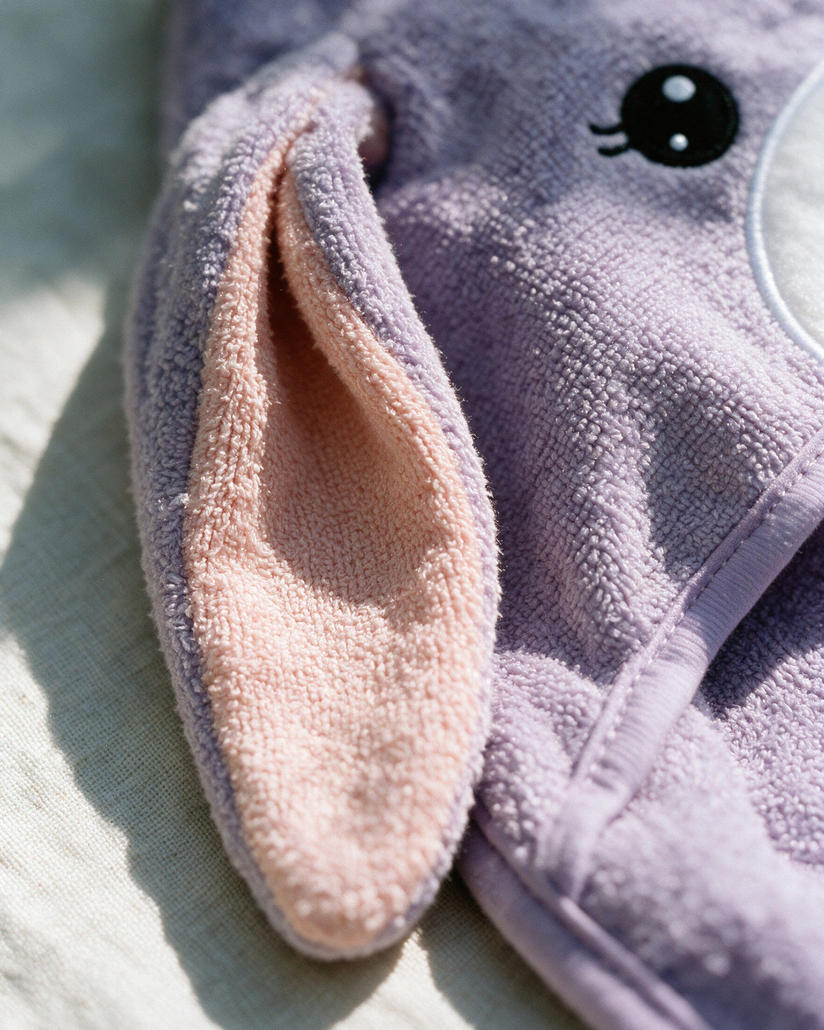 Close-up of the soft bunny ear with pink lining