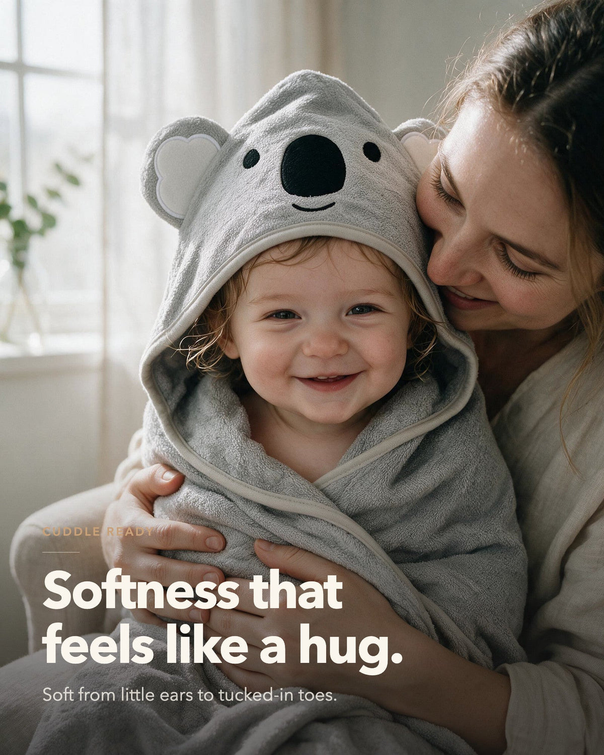 Softness that feels like a hug – mother cuddling her baby in The Koala towel