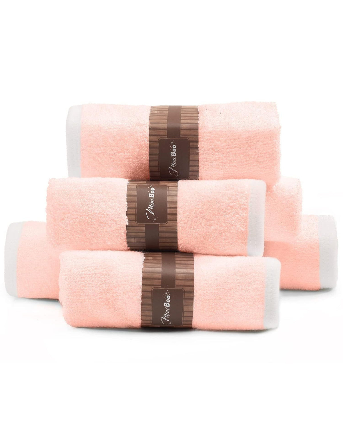 Stack of rolled pink washcloths